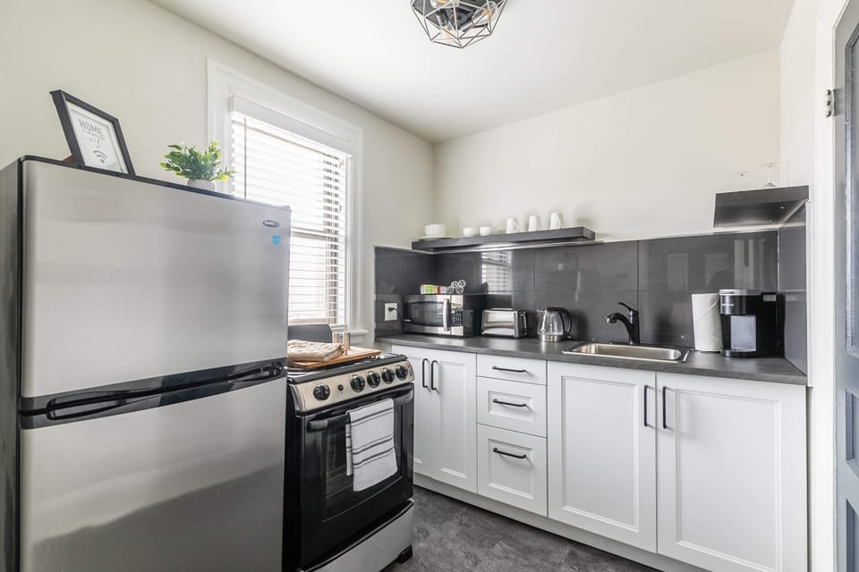 Fully Equipped Kitchen With Modern Appliances