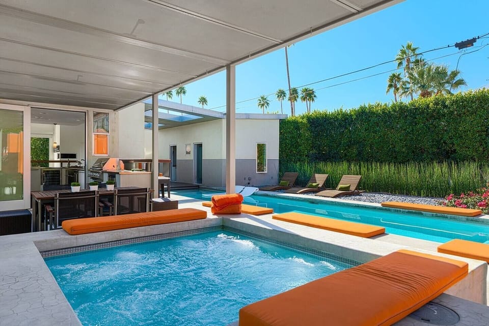 Relax in style on the lounge beds next to the jacuzzi area, the perfect spot to unwind after a soothing soak.