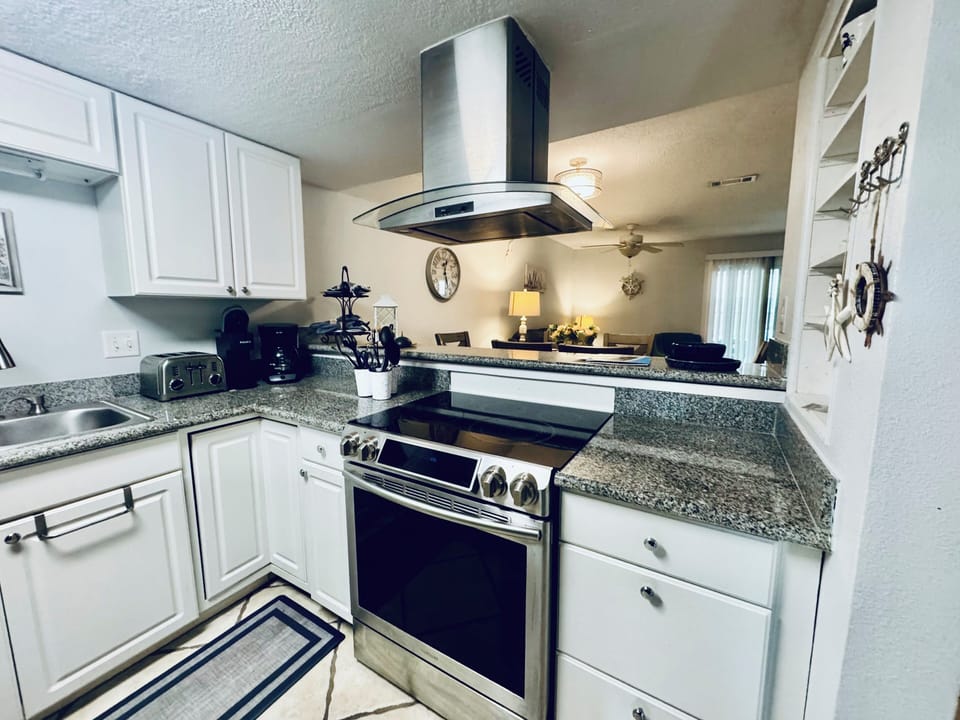 Kitchen on first floor of the townhome.  Coffee, toaster, microwave and more.
