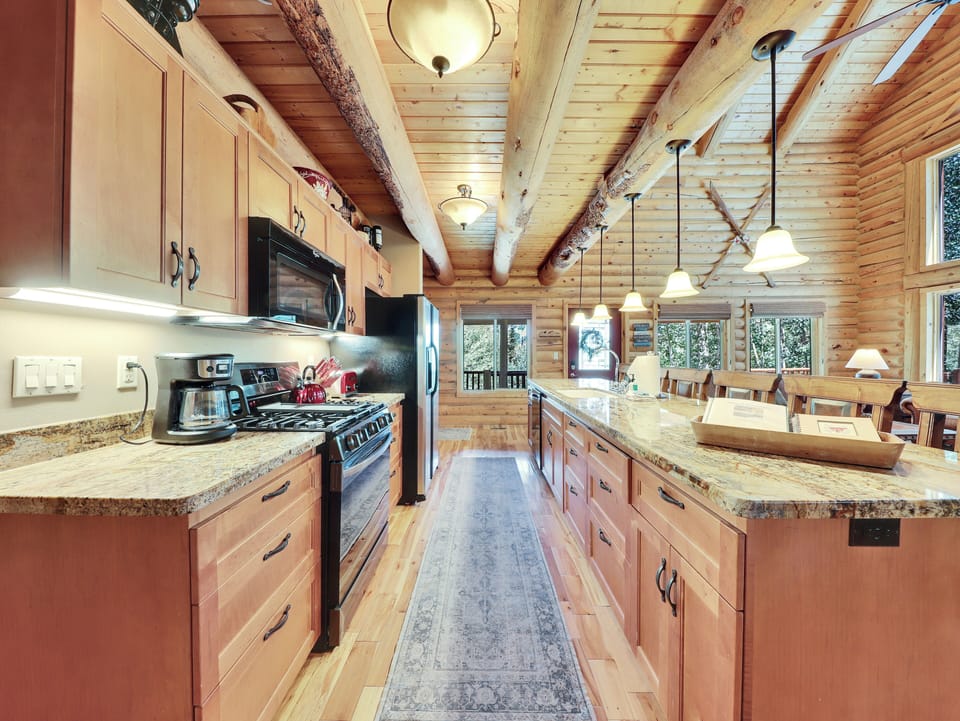 Modern galley kitchen equipped with fully updated appliances and all the essentials for a comfortable stay