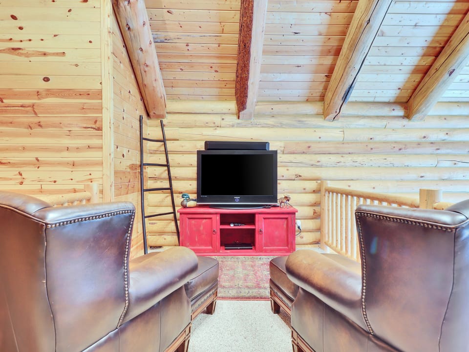 Loft Entertainment Area with 42" TV, Armchairs and DVD Player