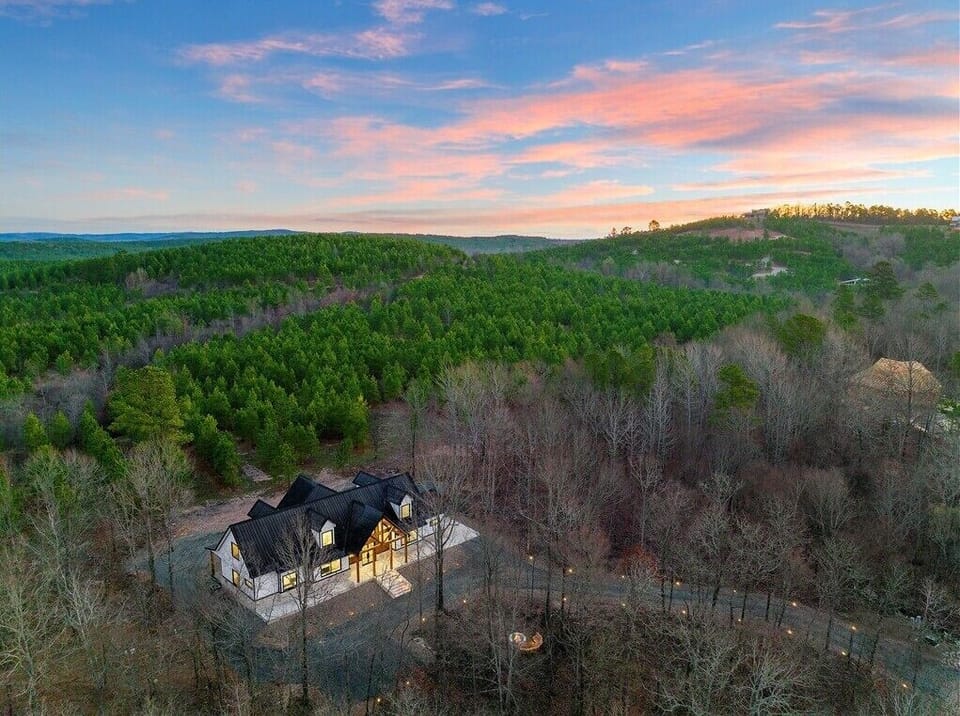 Aerial view of The Gentry. Amongst the lush forest!