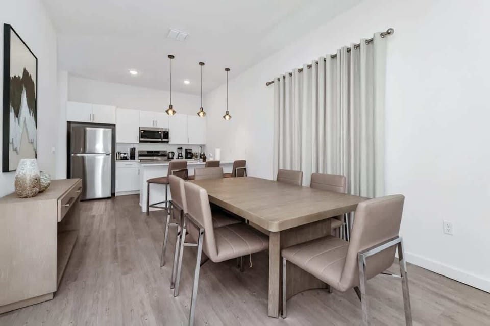 Gather Around: Where Meals Become Memories in a Cozy Dining Space.