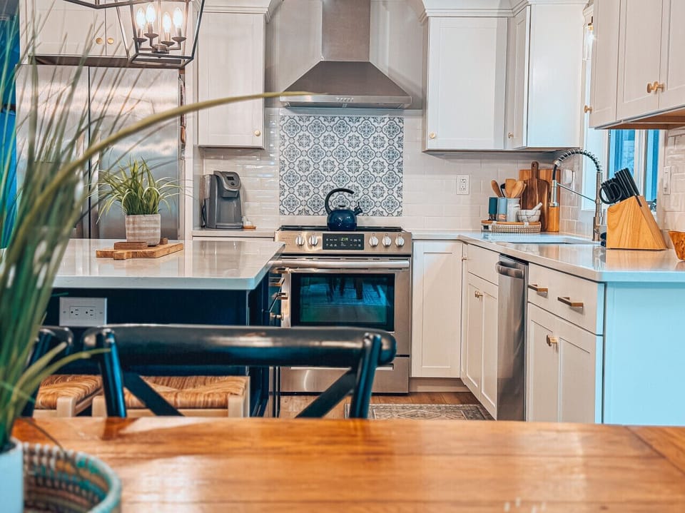 Break bread together in a beautiful setting that seamlessly connects the kitchen and living areas.