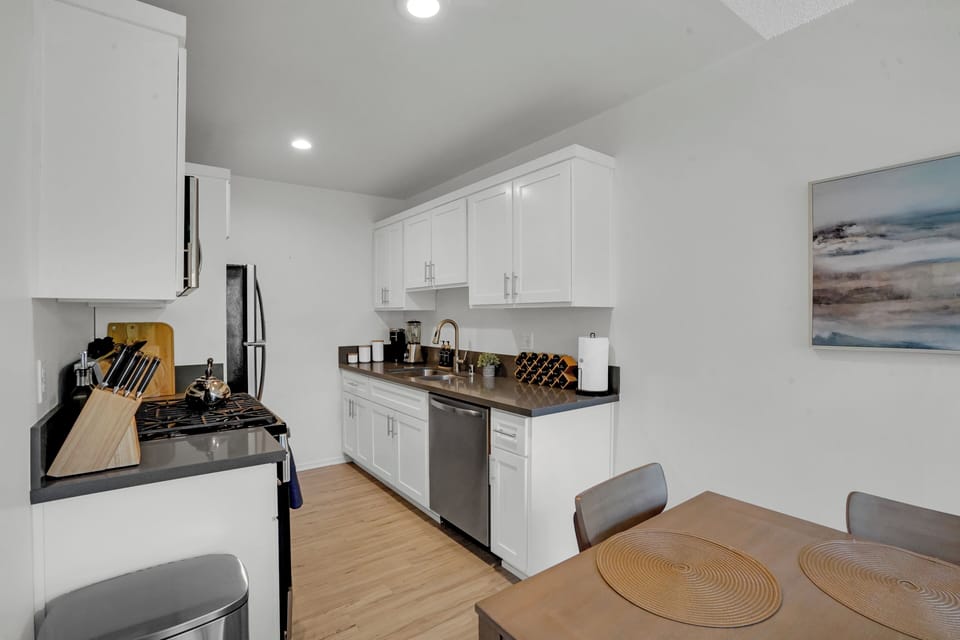 Spacious Dining Table leading to the kitchen area