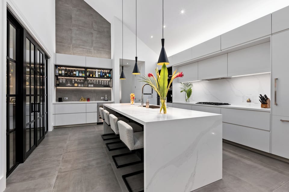Kitchen has 4 bar stools