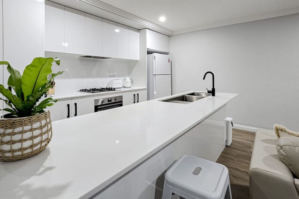 Spacious benches anchor the open kitchen.