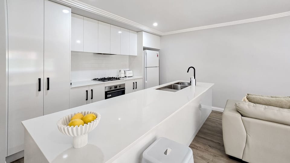 The kitchen is fully equipped with modern appliances, quality cookware, and everything needed for home cooking.