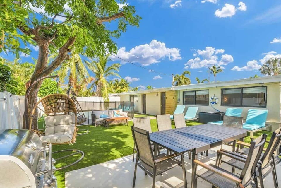Whether you’re sipping a morning coffee or unwinding with an evening drink, the poolside area offers a relaxing retreat. Adjacent to the pool, a stylish outdoor dining set awaits, ideal for al fresco meals or casual gatherings under the stars.