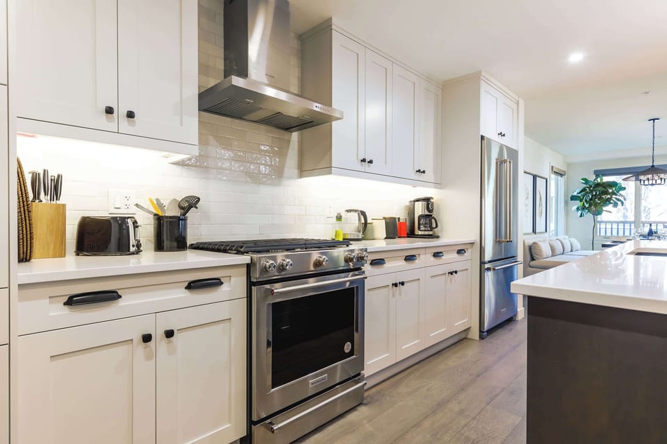Well equipped kitchen with stone countertops and stainless steel appliances. Kitchen with stone countertops and stainless steel appliances. Everything you need to cook and gather together!