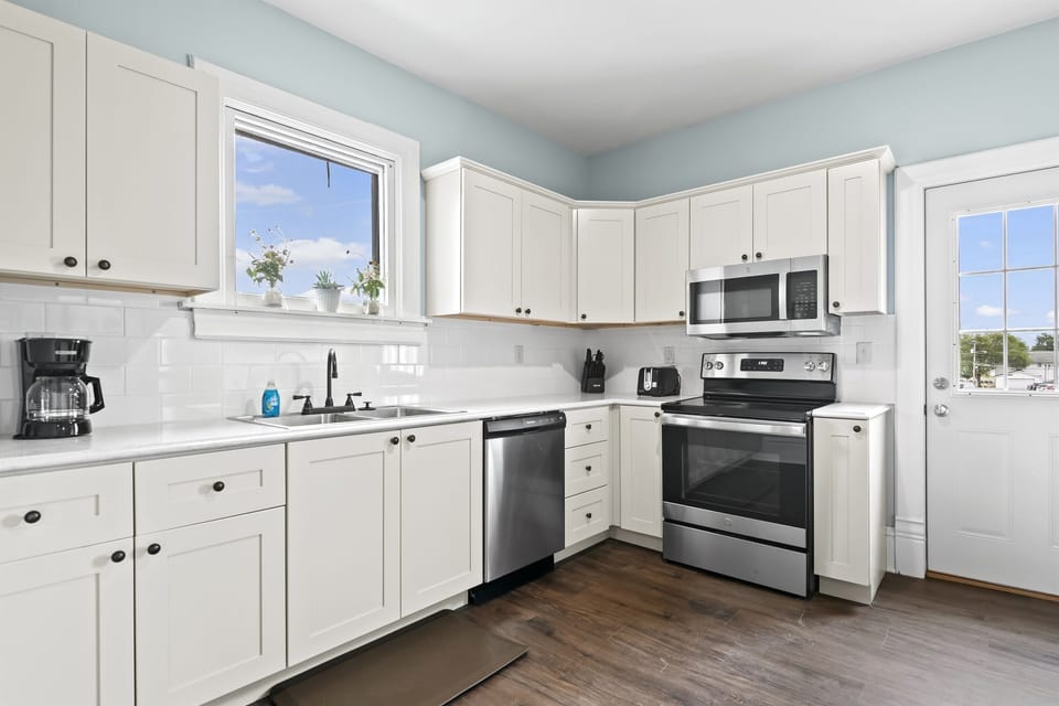 Kitchen: Bright and airy with modern appliances and fresh views—cook up a storm in style!