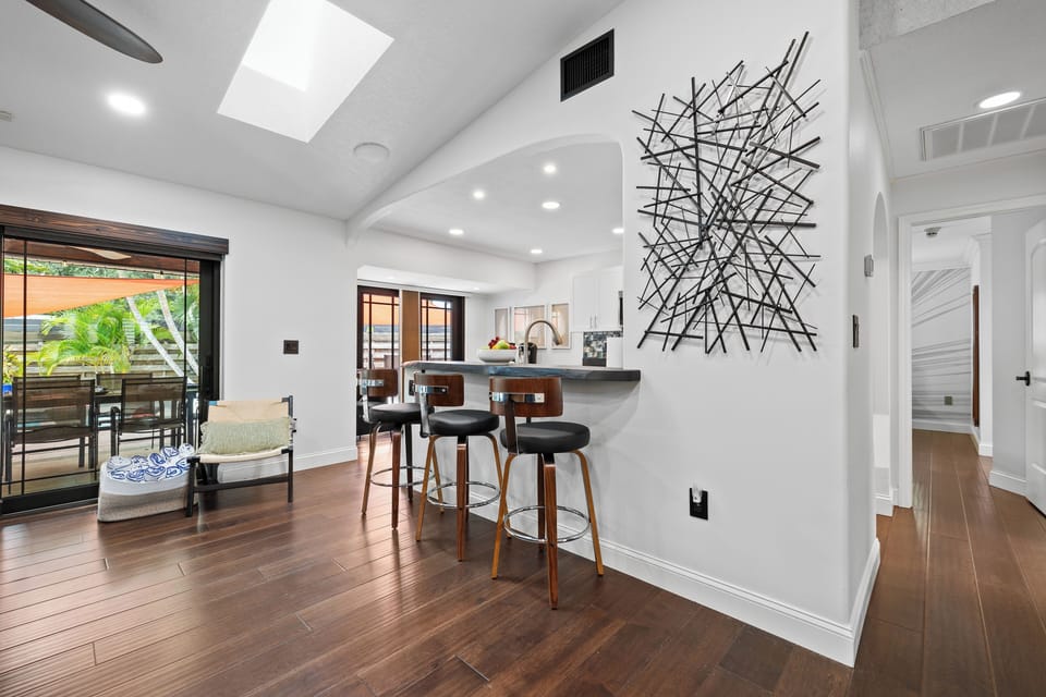 The kitchen has bar seating for 3