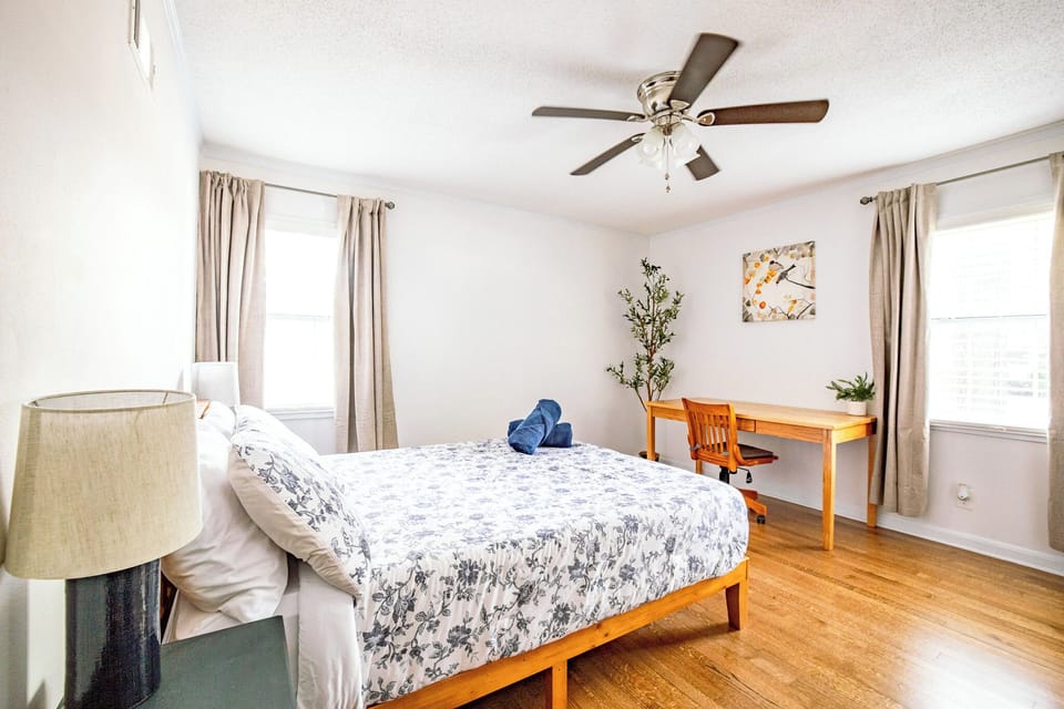 Bedroom #1: Queen bed w/en suite bathroom, desk, full length mirror, blackout curtains