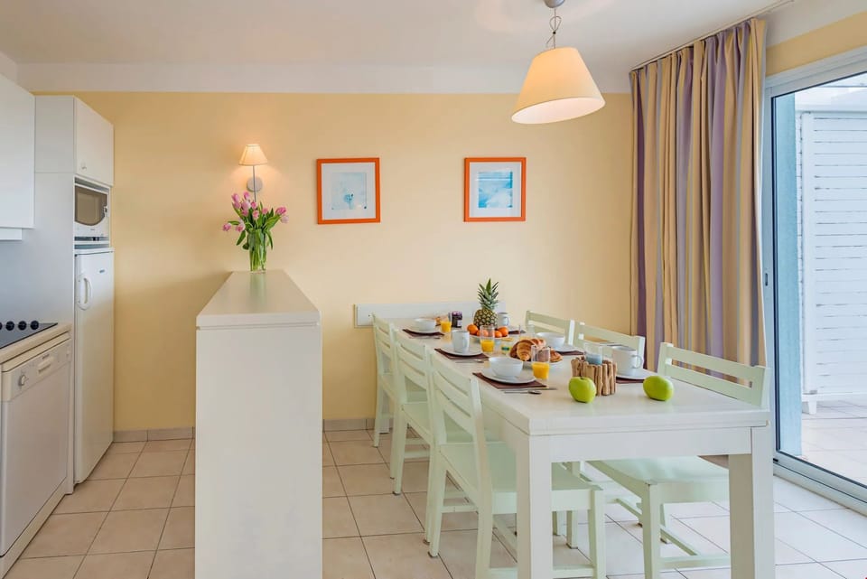 Entertain and enjoy meals together at the dining room table.