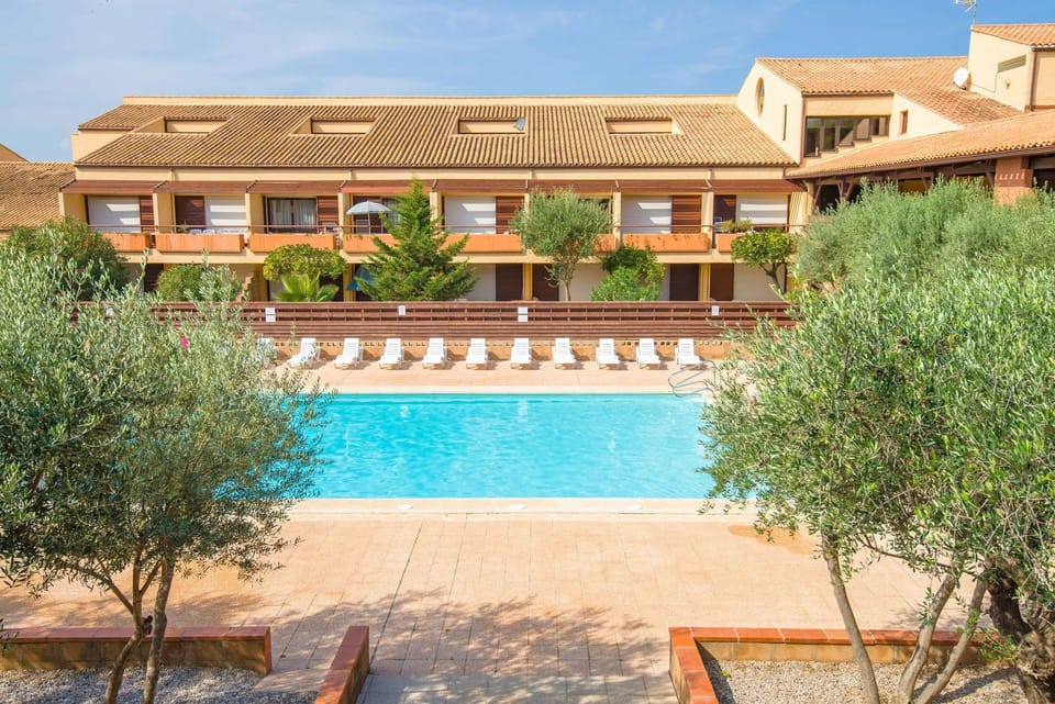 After exploring the beaches and shops, lounge by the outdoor pool and soak in the views.