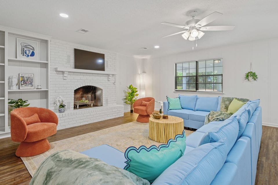 Living Room with comfortable seating, smart TV, and the inviting ambiance