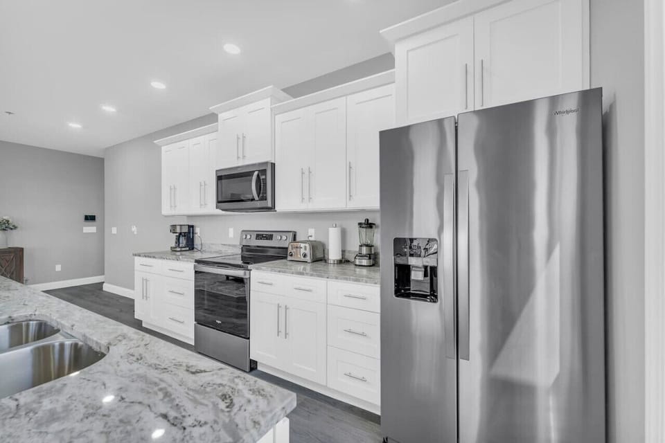 Kitchen with brand new stainless steel appliances