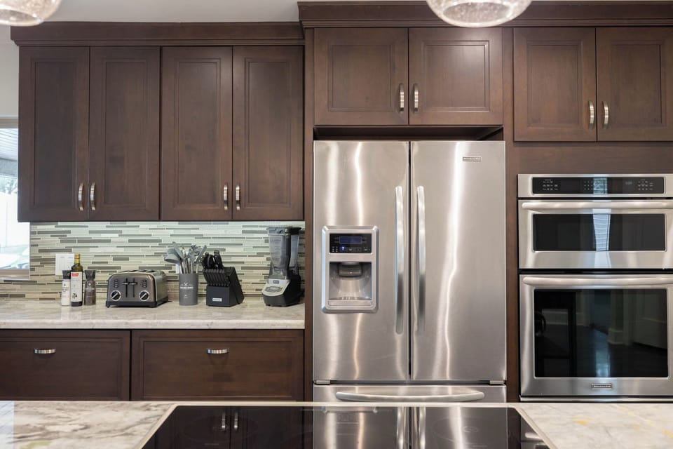 Prepare meals with ease in the fully equipped kitchen, complete with top-of-the-line stainless steel appliances