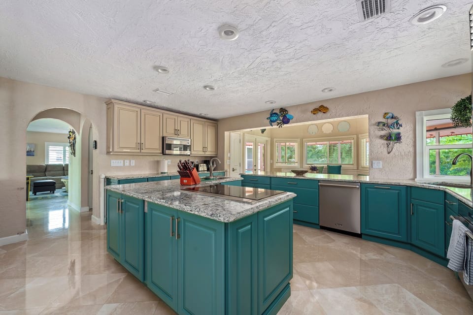Spacious, well-equipped kitchen — perfect for family breakfasts, group dinners, and everything in between.