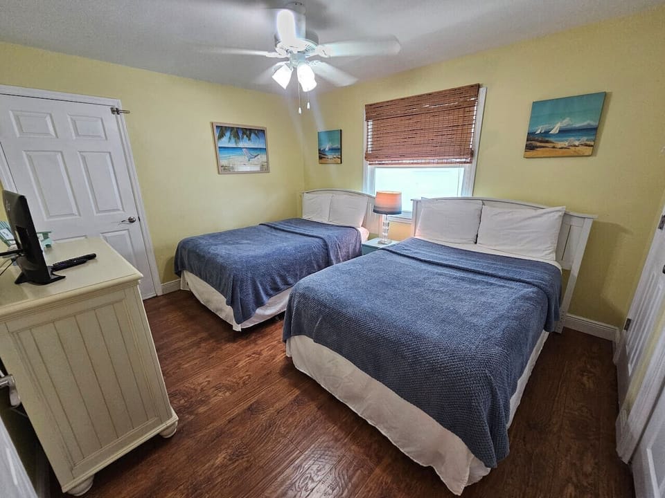 Yellow Room- Two Full-Sized Beds; TV on Dresser