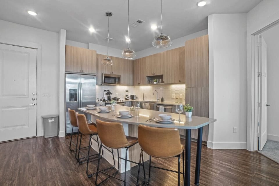 The dining room is bathed in natural light, creating a bright and inviting space where every meal feels special.