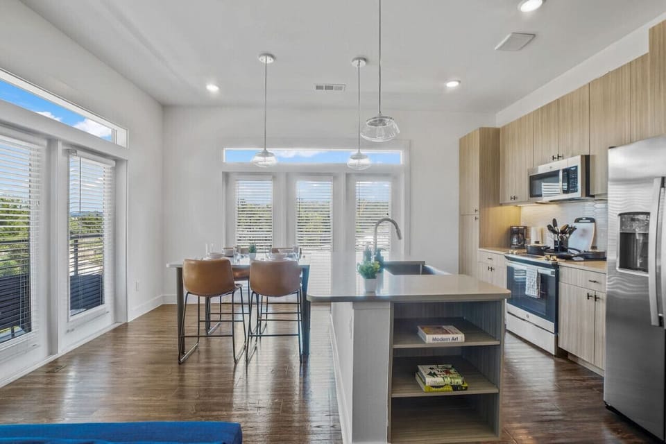 The kitchen invites you to experiment with new recipes, offering a stylish and practical space to cook and create.