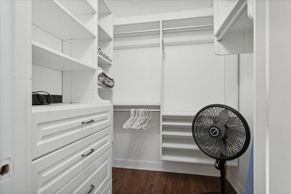 The very large walk in closet has more space than you may know what to do with!