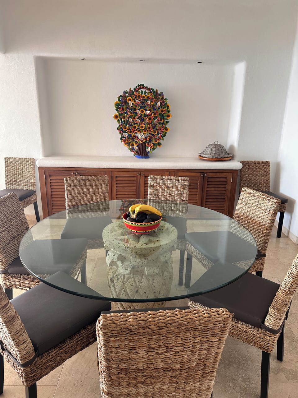 Dinning table seats 8 people and up to 10, with open views to the ocean