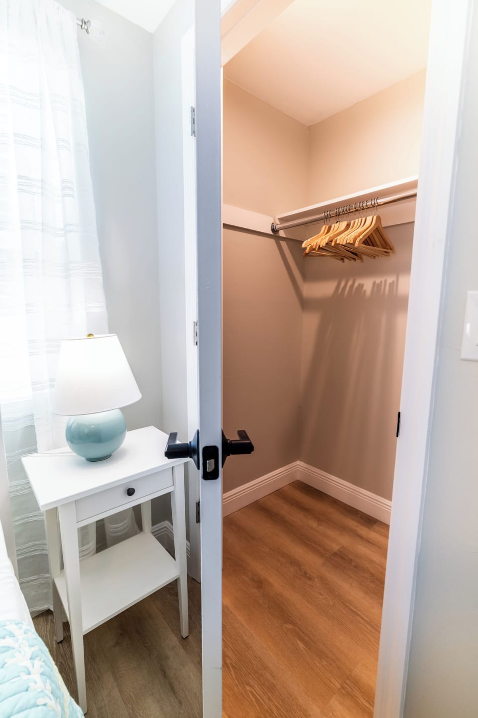 Closet space with room for storage. 