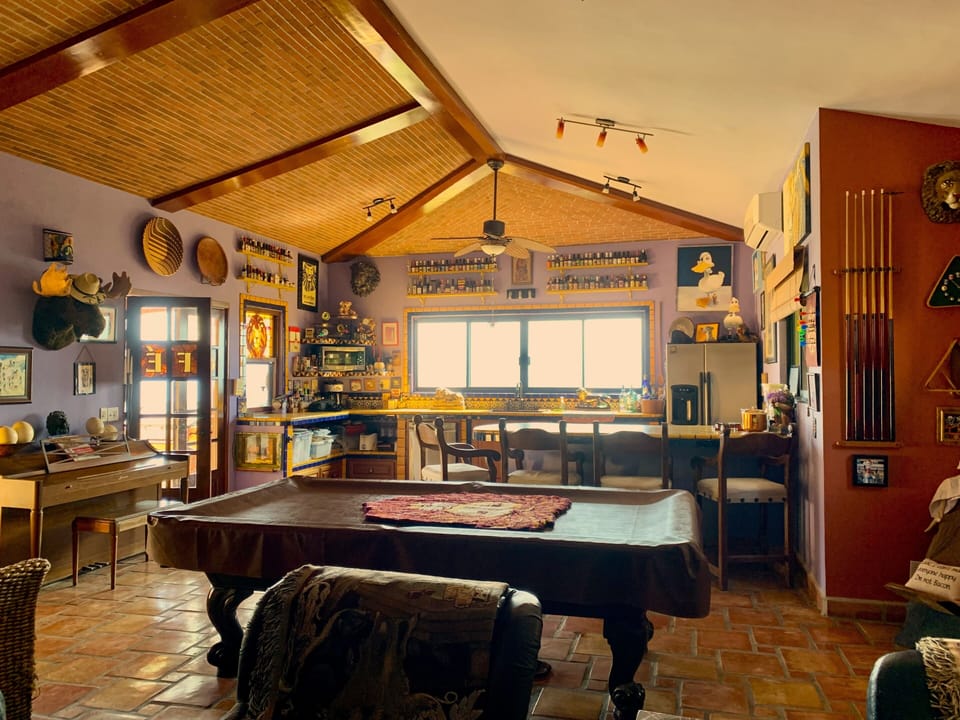 The cabana…pool table, 65 in tv, full size sofa bed and full bath.