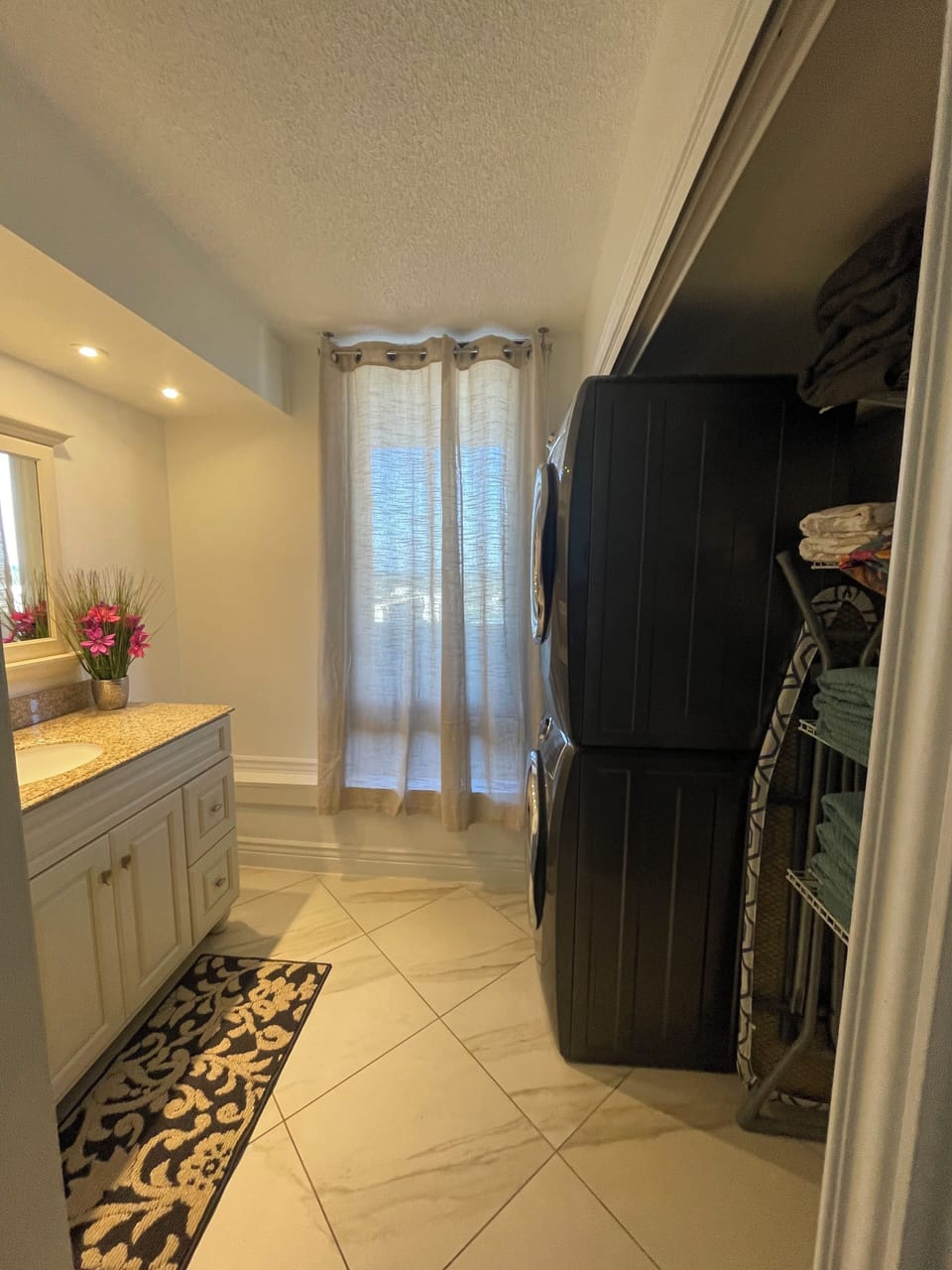 Private master bath with laundry