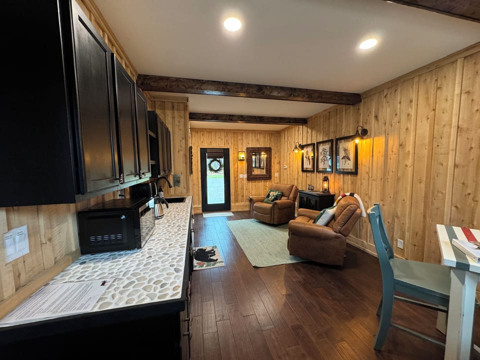 Kitchenette on left (contains mini-frig/freezer, sink, micro, coffee pot, etc..)