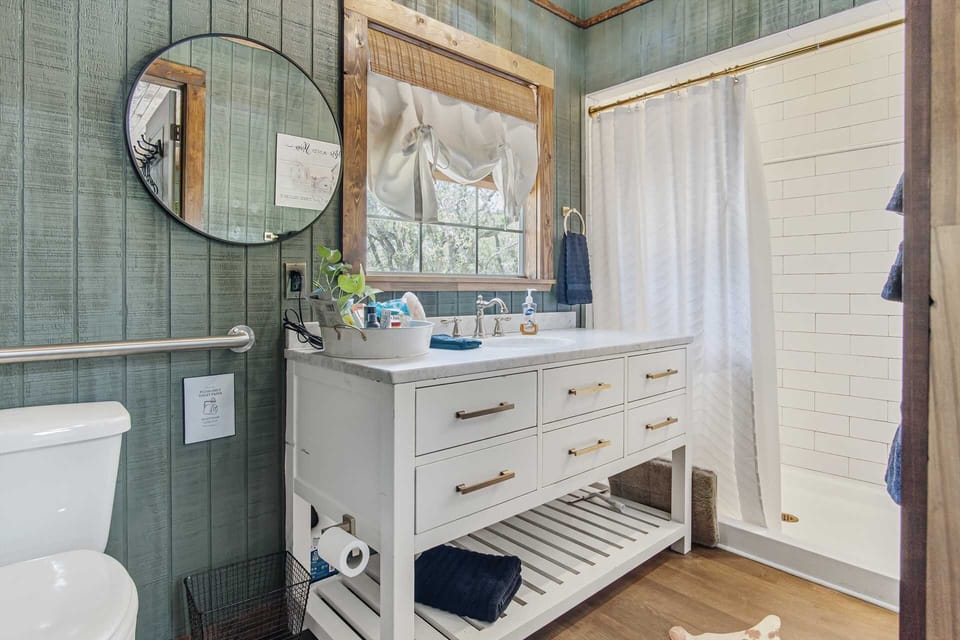 Your sparkling-clean full bath includes basic toiletries, fresh linens, and a roomy step-in shower stall.