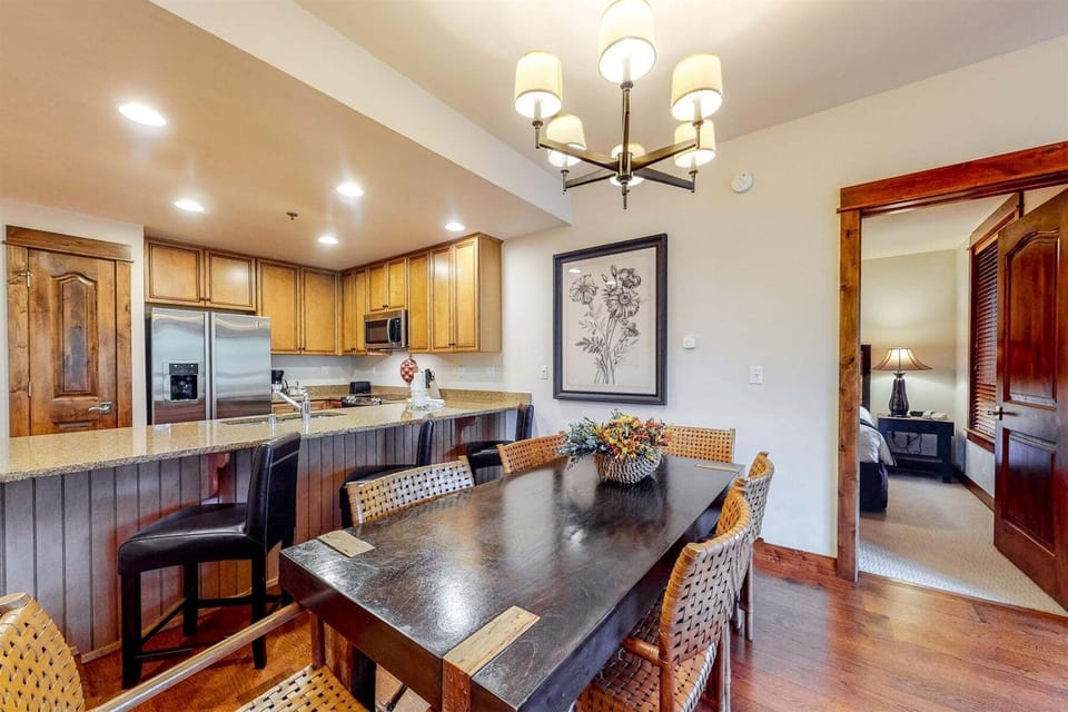 Barstool seating along with dining room table provide space for entertaining
