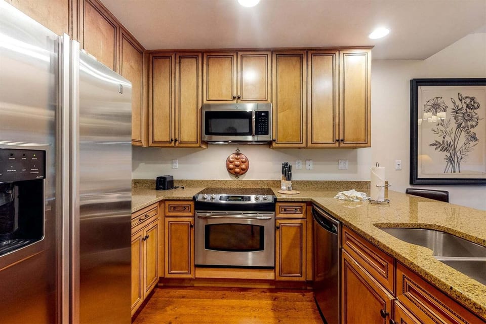 Stainless steel appliances in this updated kitchen