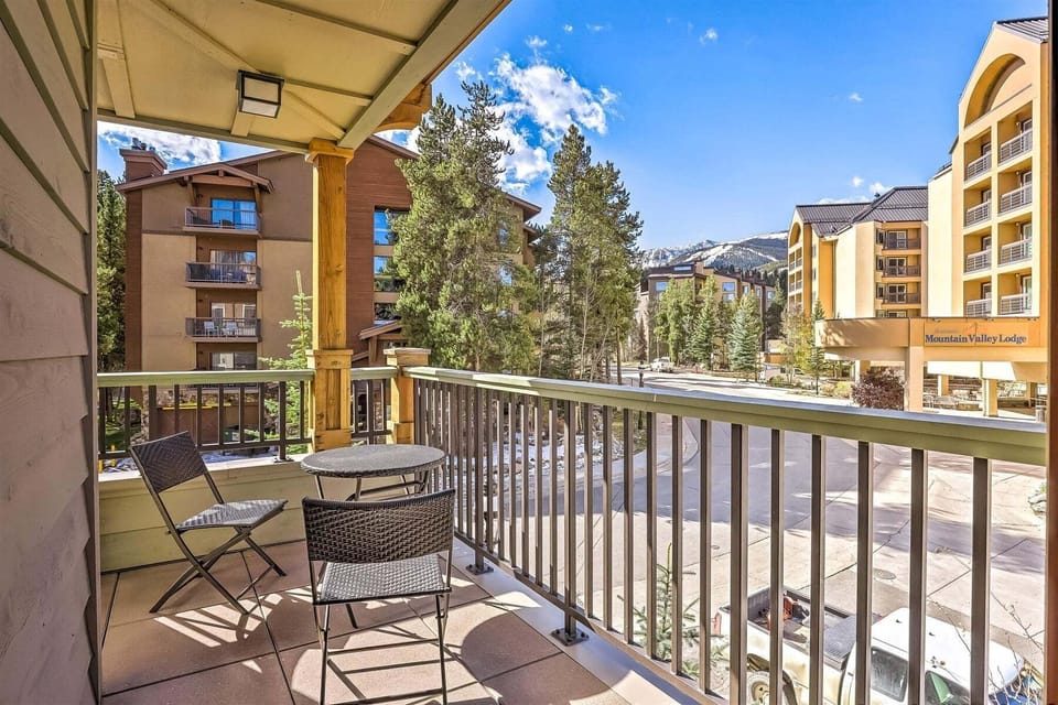 Enjoy a glass of wine while taking in the crisp mountain air