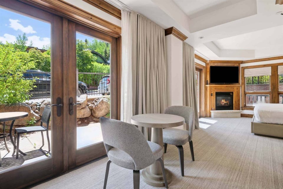 Primary Bedroom features patio and gas fireplace