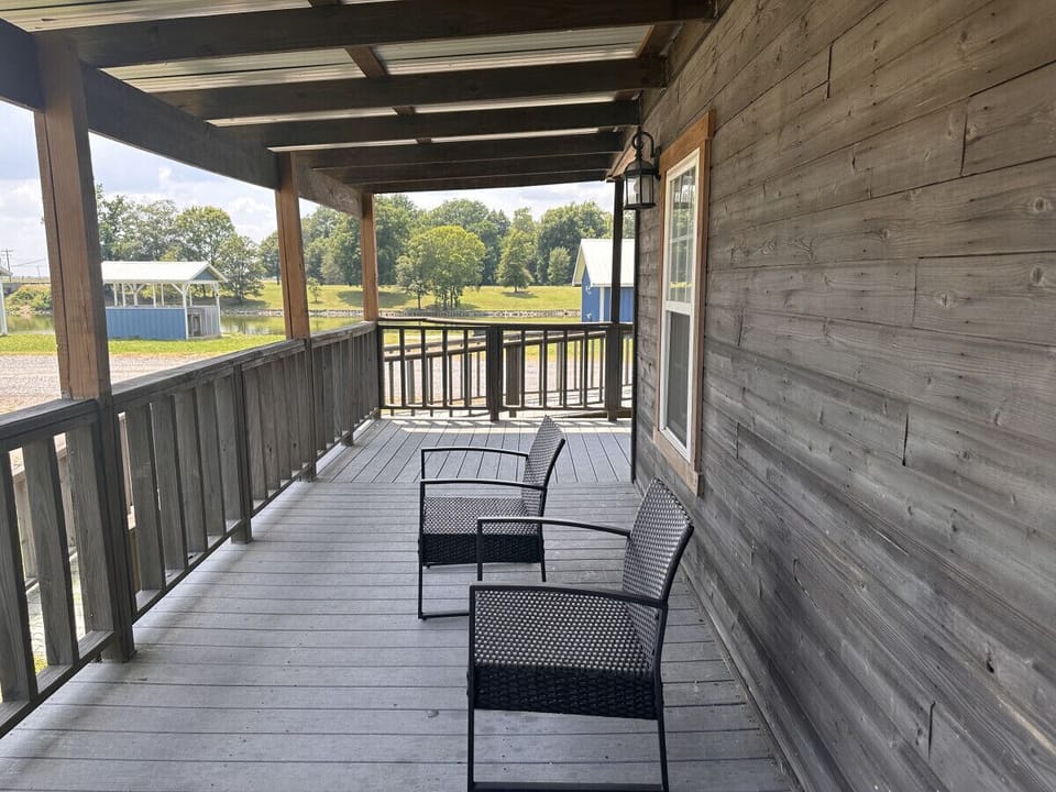 Porch with chairs for enjoying the view.