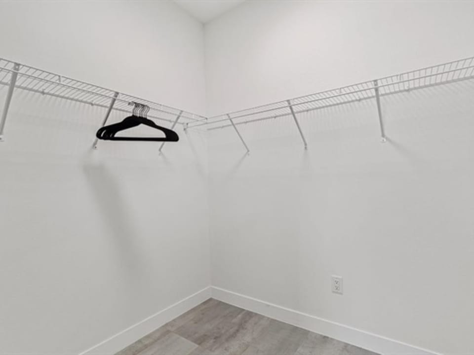 Walk in closet of the master bedroom.