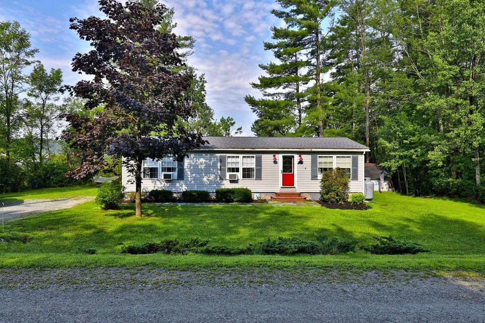 Charming lakeside escape, surrounded by trees, near the stunning Lake Bomoseen in Vermont. 3-bedroom, 2-bathroom cottage.