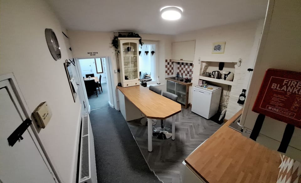 A fully fitted Kitchen which includes coffee Machine, microwave.