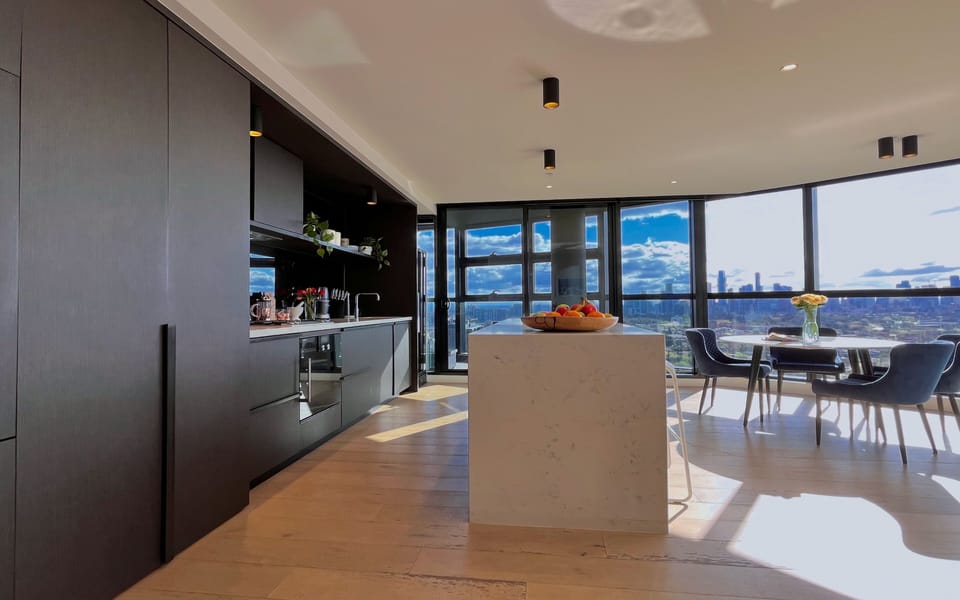 Luxury kitchen with views of the Melbourne city skyline
