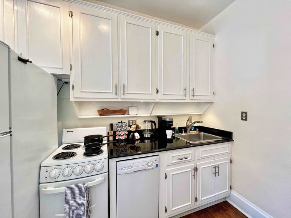 Whip up your favorite meals in this cozy, fully-equipped kitchen, set within a charming Old Town Alexandria apartment that's a stroll away from local food markets and culinary delights.