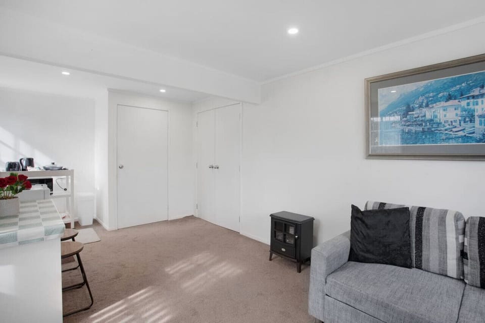 The doors go into the bedroom and bathroom are with the pantry on the right.
