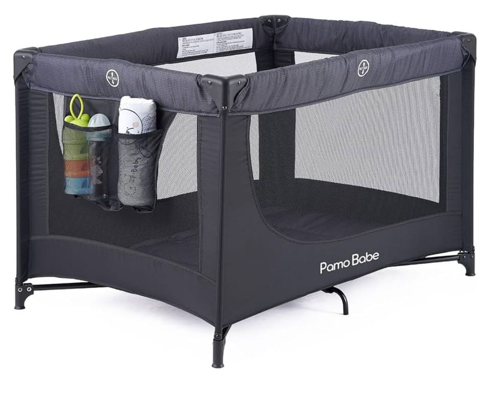 Bedroom #2- Pack N Play with sheet in closet.