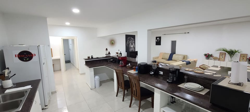 Kitchen top on right hand 
