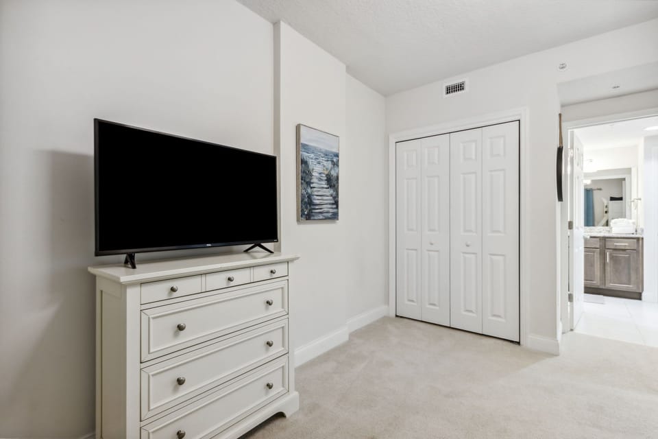 Guest room 2 with access to bathroom.  Smart TV