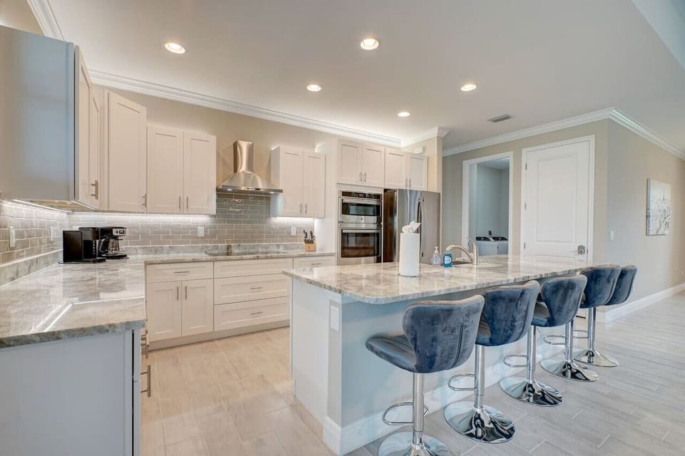 Kitchen with Island and 4 Bar Stools