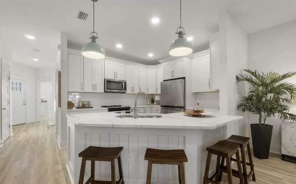 Step into our spacious kitchen, offering plenty of counter space; perfect for cooking and entertaining with loved ones!
