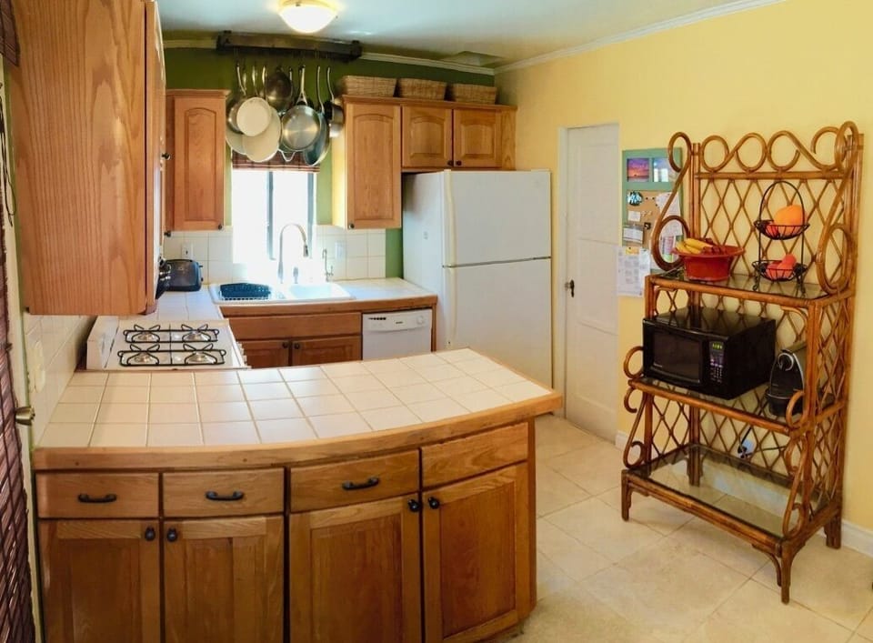 214 kitchen includes full size appliances and fully stocked cabinets.  Sink includes pull down faucet and water filter dispenser.